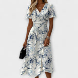 Карина - Елегантна рокля с флорален принт