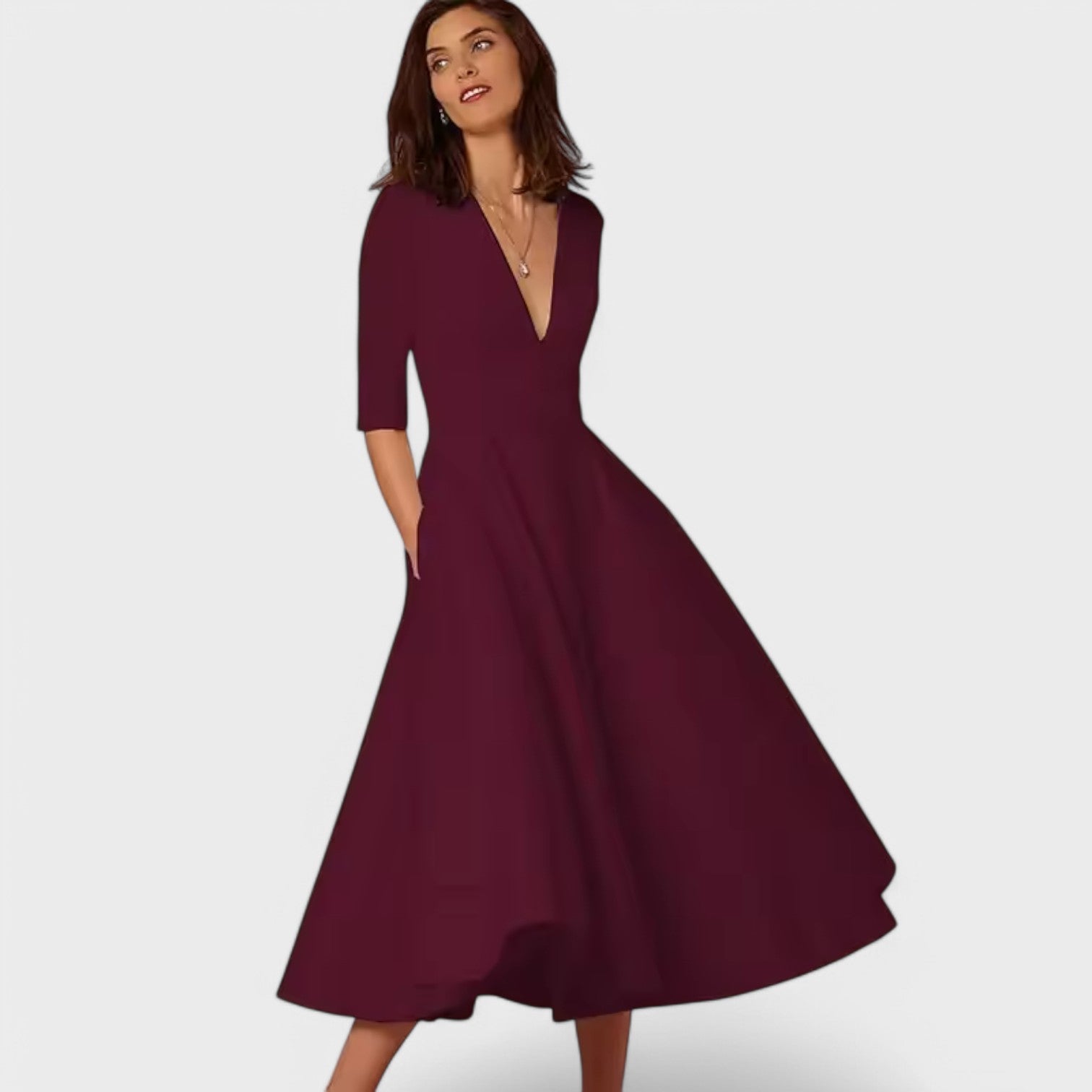 Елеонора - Елегантна рокля с V-образно деколте